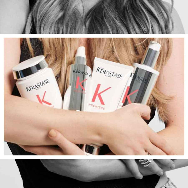 Kérastase hair care products held by a person with close-up of hair.